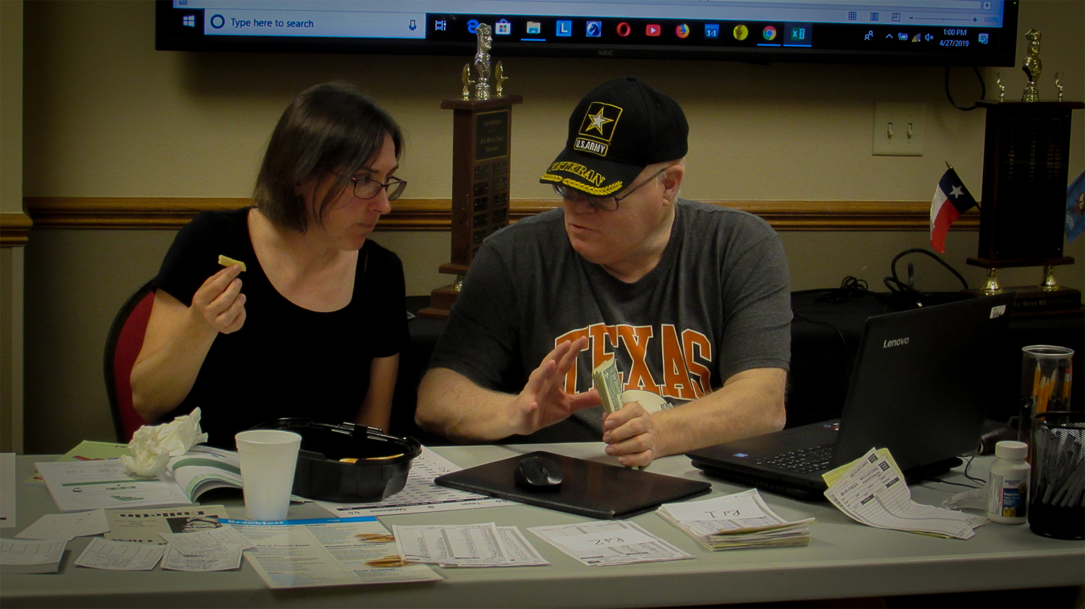 Director of Quality Control Josie Braddy (left) worked through lunch ensuring the money was straight, the score sheets were organized and the results were captured correctly.  She was a huge help to Chief TD Jim Hollingsworth (right).  Photo by Mike Tubbs.